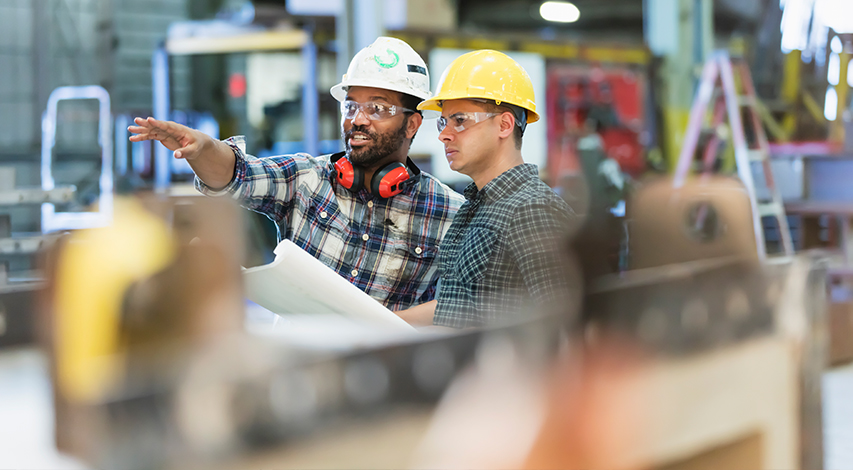 union leaders from master plumbers association image of union member guiding a union member